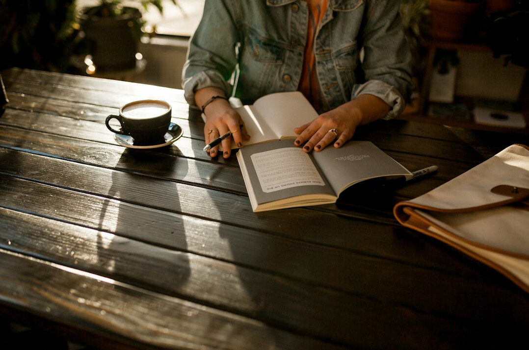 woman writing in journal